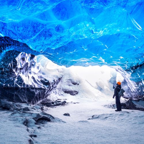 traveler-in-ice-cave-PT98G9X traveler-in-ice-cave-PT98G9X